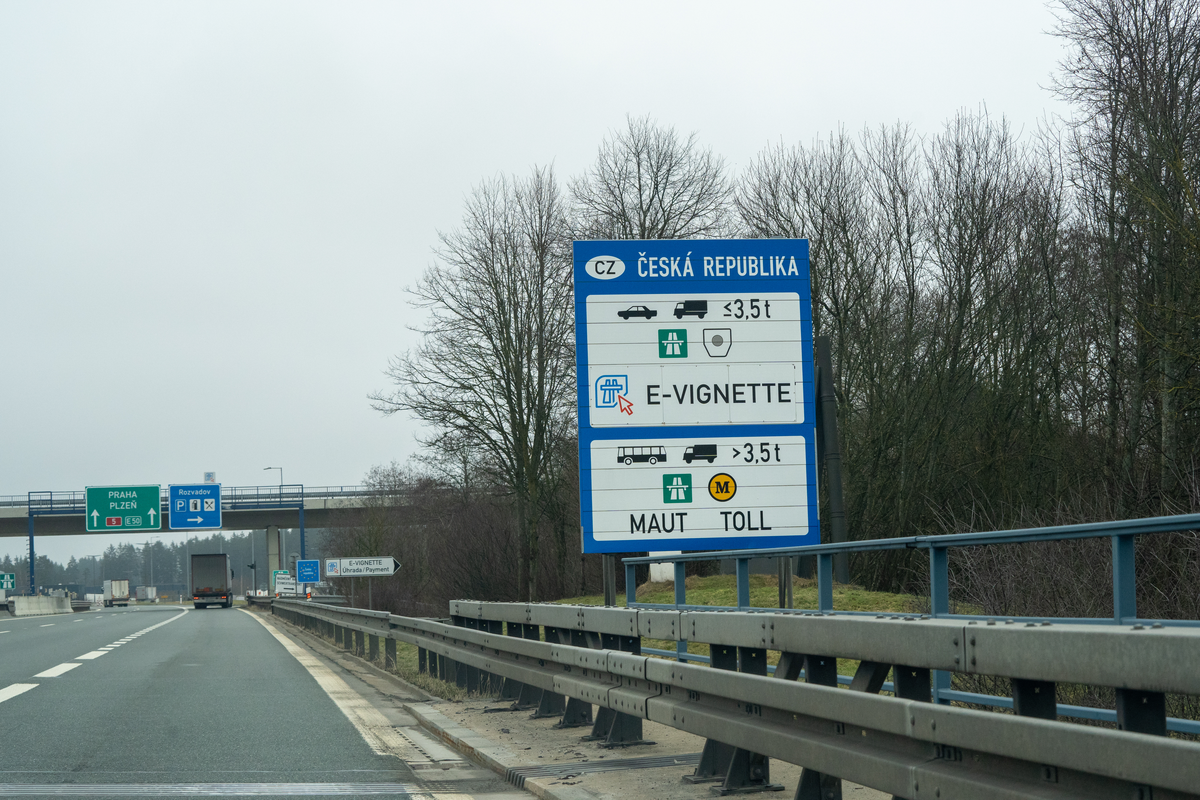 Czech Republic Česká Republika e-vignette and Maut toll sign on D5 motorway near Rozvadov German border with Praha Plzeň direction signs and E-Vignette payment point visible, February 2026