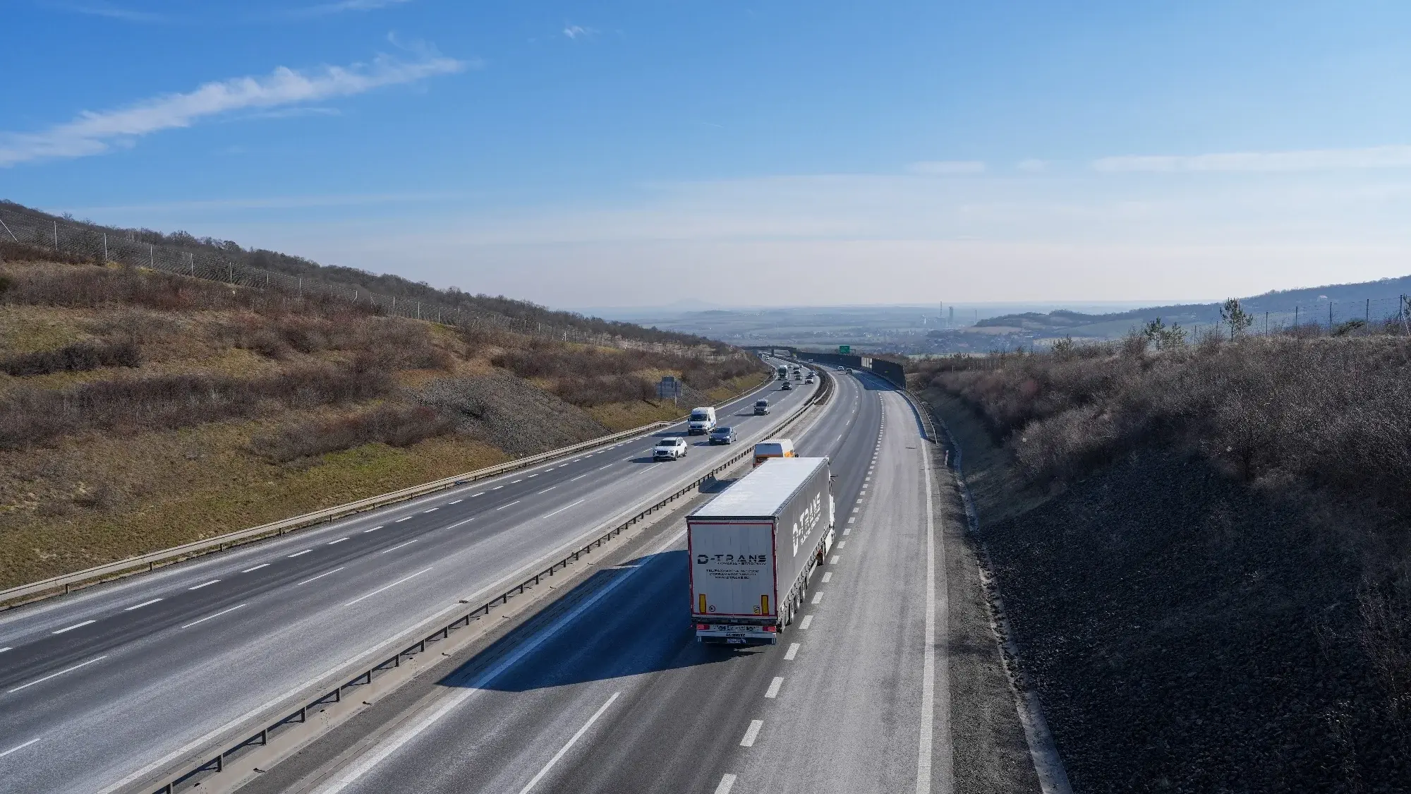 Czech D8 motorway at the Petrovice–Breitenau border crossing with Germany, photographed from the bridge observation point, February 2026