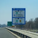 Czech Republic (Česká Republika) toll sign on the D1 motorway near Bohumín showing e-vignette/e-winieta requirement for vehicles up to 3.5t and Myto toll for vehicles over 3.5t, with distance signs to Praha, Brno and Ostrava